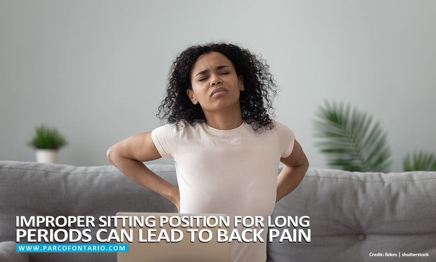 Improper sitting position for long periods can lead to back pain